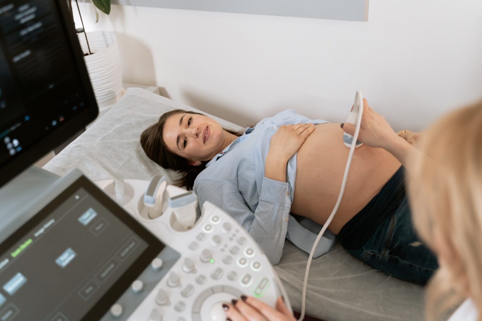 Gynecologist Doing An Ultrasound On A Pregnant Woman